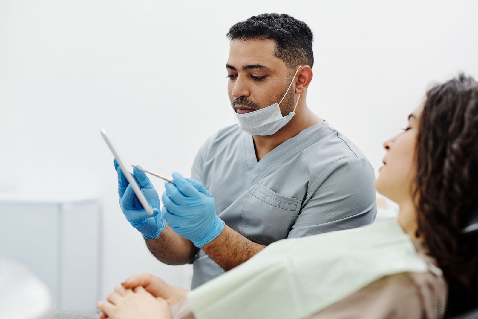Healthcare professional using a tablet with medical technology