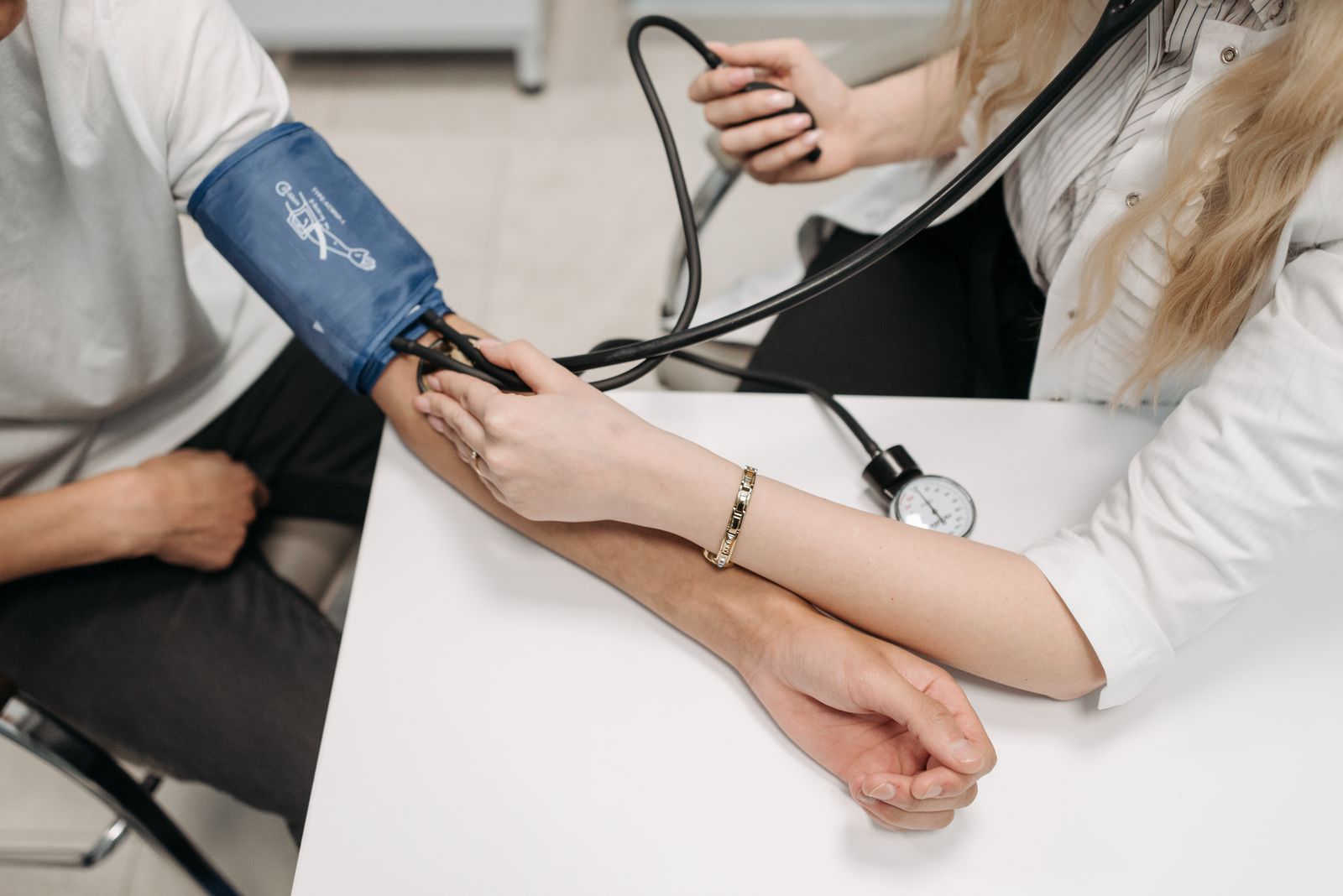 Blood pressure being measured with a cuff