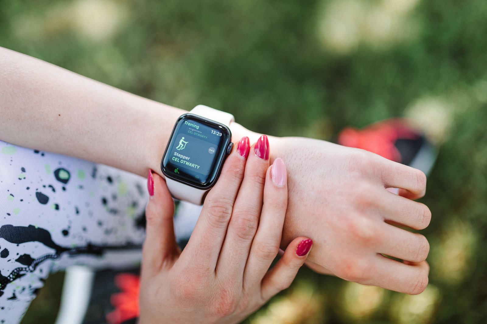 Person checking health data on a smartwatch