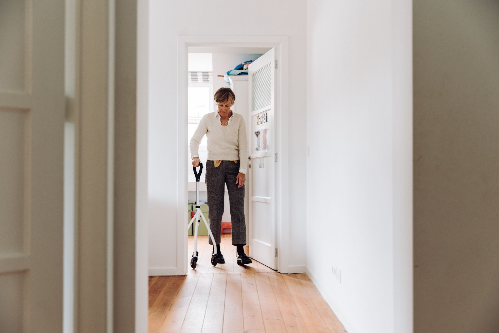 Person with a prosthetic leg walking during rehabilitation